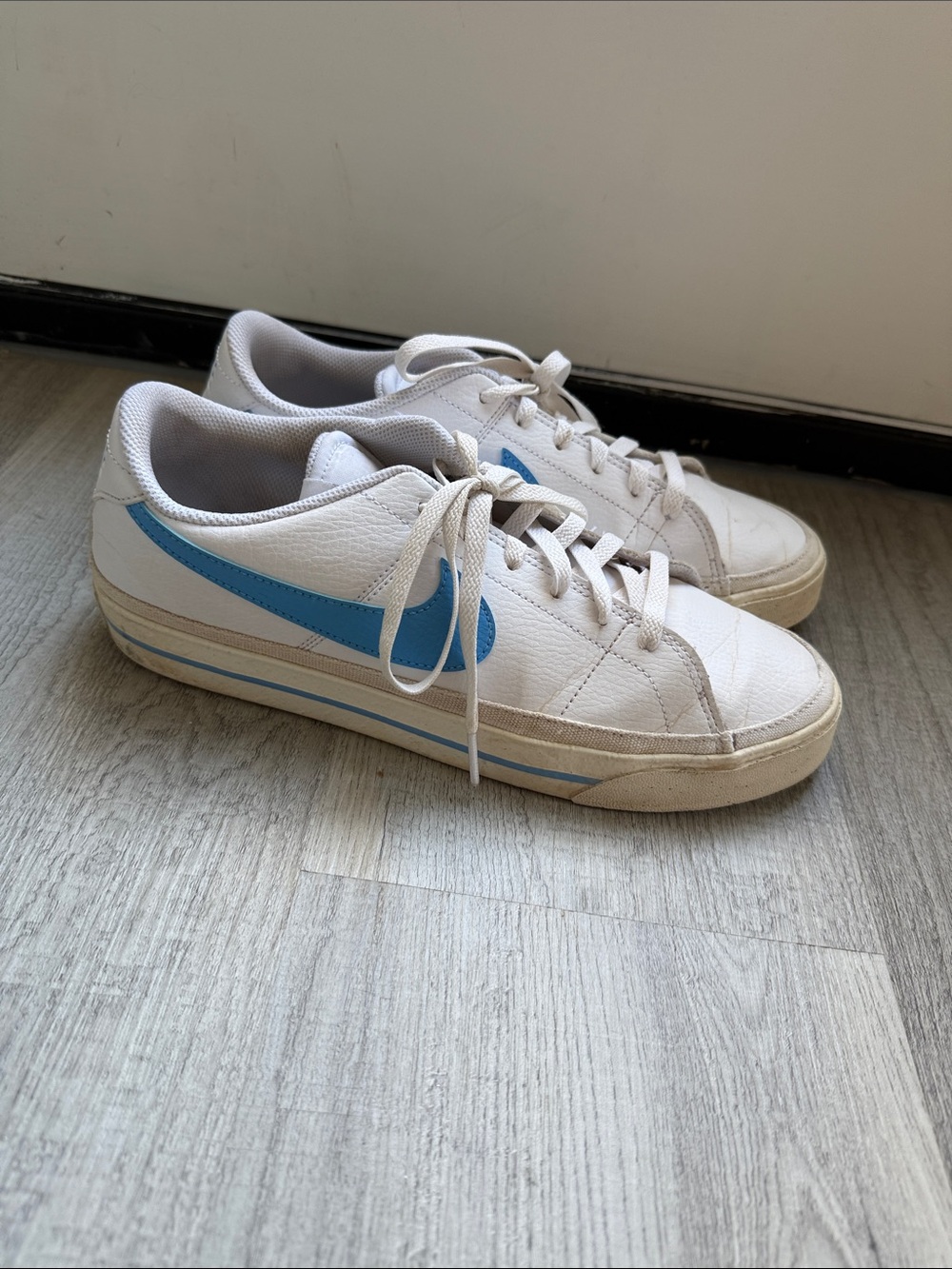 Nike Men’s White Sneakers with Light Blue Swoosh